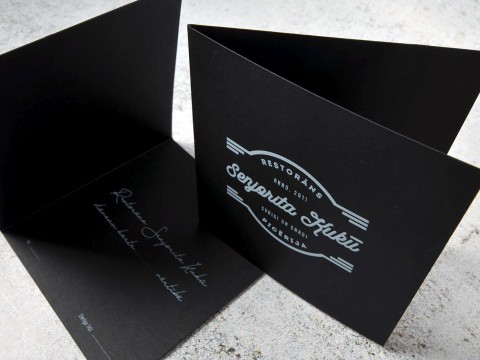 Black greeting card printing with white